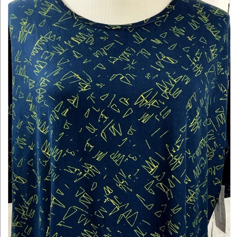LuLaRoe NWT M Irma Tunic, dark blue w/ yellow designs, brushed feel fabric.